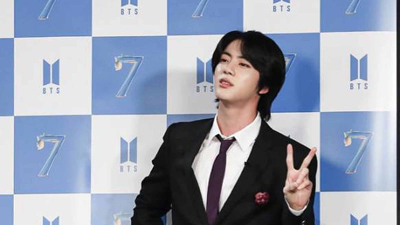 Singer Jin Is Wearing White Coat Suit Standing In Wall Hanging