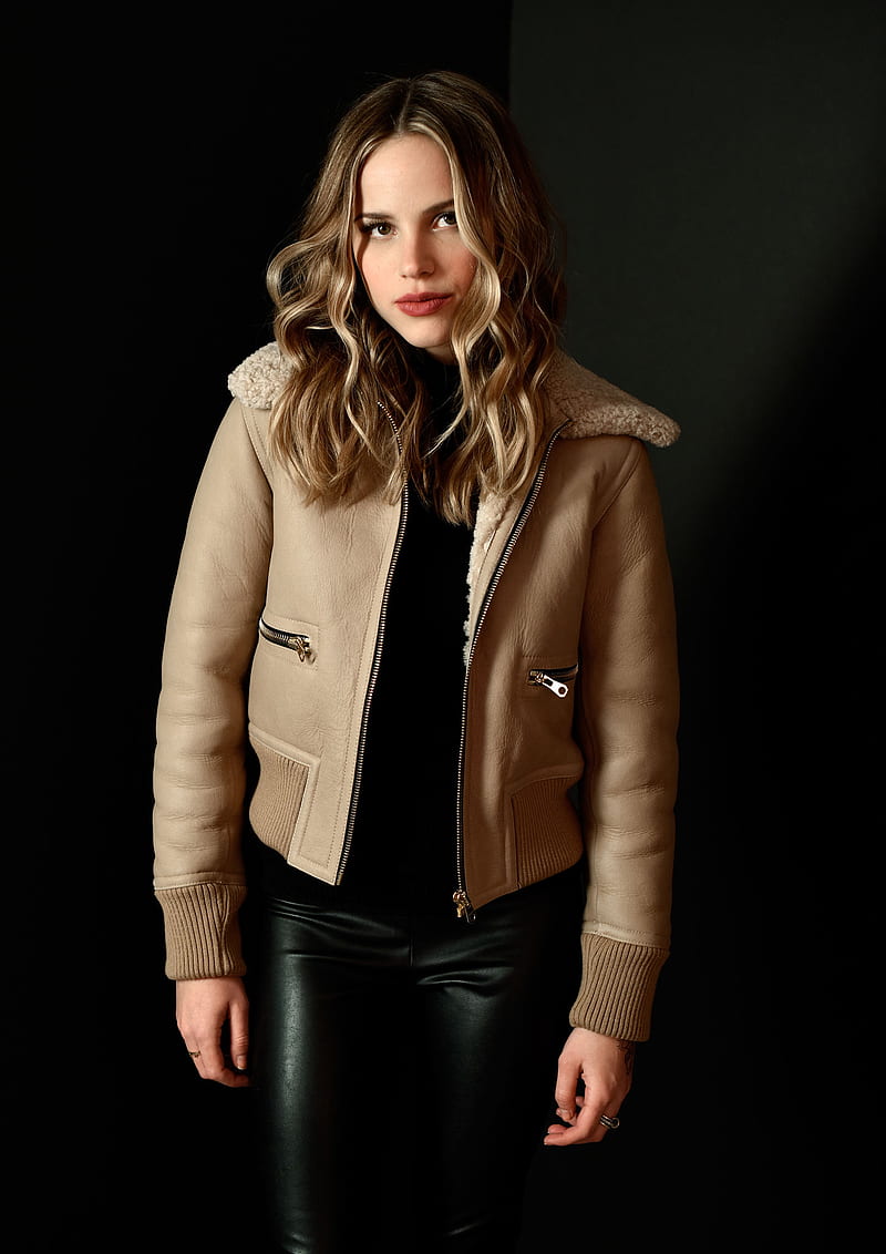 Halston Sage, actress, women, jacket, blonde, curly hair, looking at viewer, leather pants , leather jackets, brown jacket, celebrity, black pants, open jacket, zipper, HD phone wallpaper