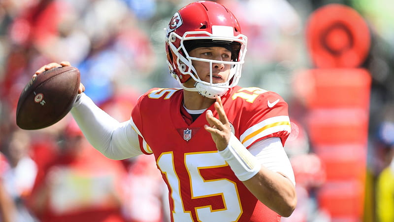 patrick mahomes is having sprint football in one hand wearing red sports dress in blur background sports-, HD wallpaper