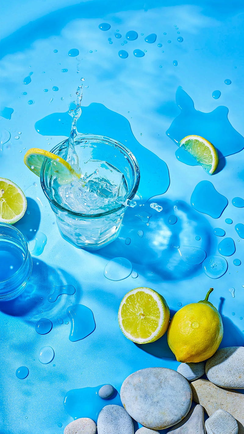 Lemons and vodka, blue, cocktail, cup, drink, droplets, stones, yellow, HD phone wallpaper