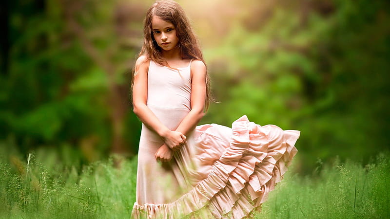 Cute Little Girl Is Standing In Green Trees Background Wearing Peach Color Dress Cute, HD wallpaper
