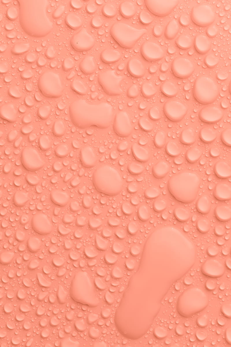 Plain light peach colored background with transparent water drops of different sizes and shapes flowing down and placed close to each other, HD phone wallpaper