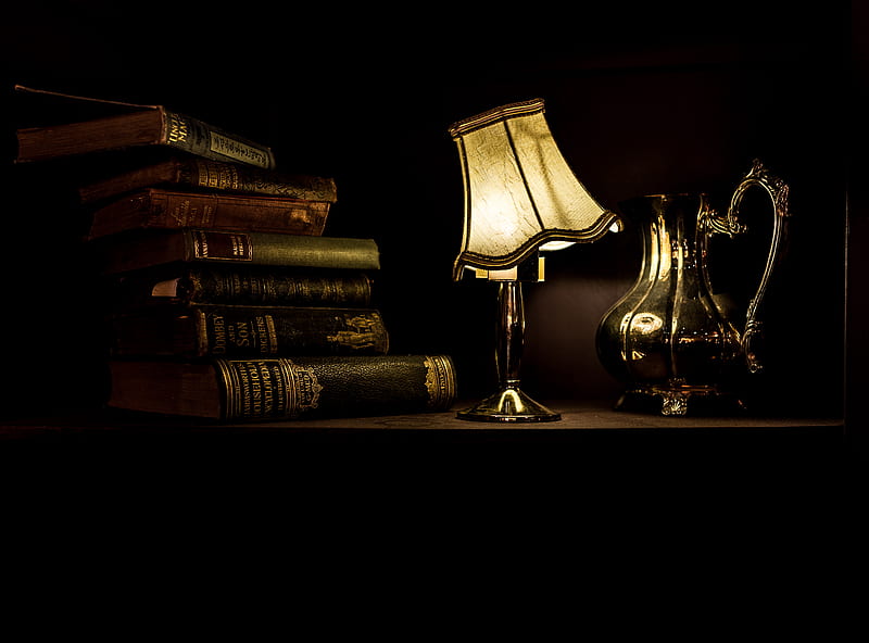 turned on desk lamp beside pile of books, HD wallpaper