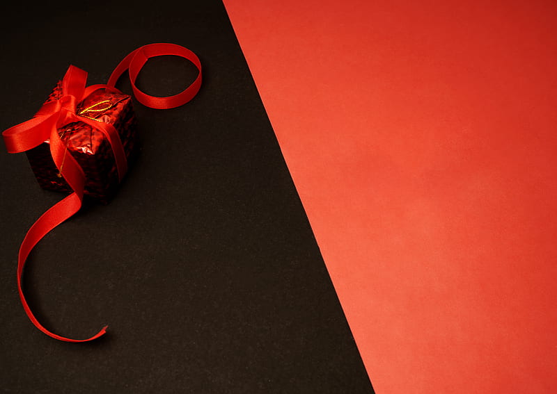 red and black plastic toy on black table, HD wallpaper