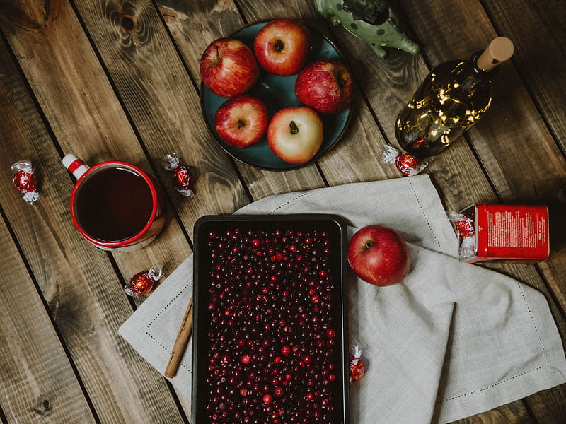 red apple fruit on black tray beside red ceramic mug, HD wallpaper