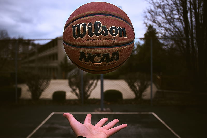 person releasing orange Wilson basketball ball, HD wallpaper