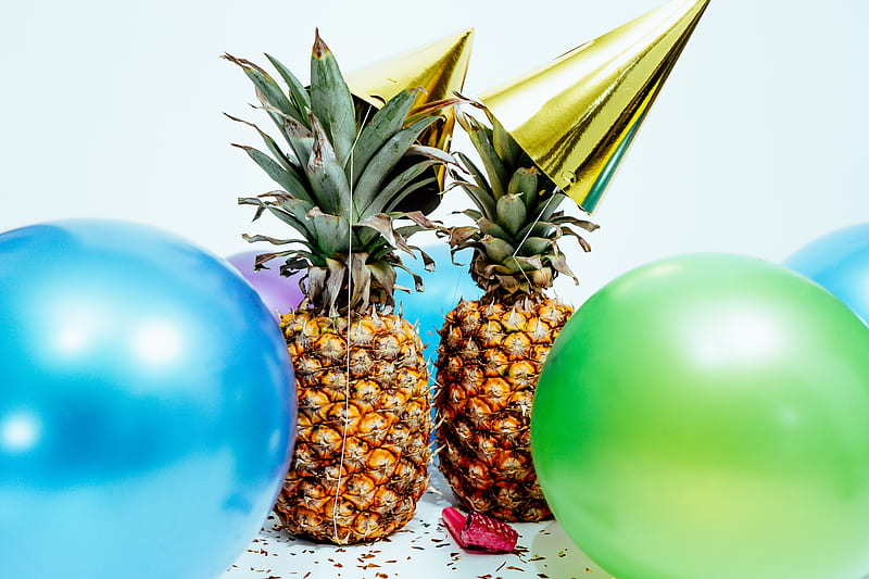 two pineapples with gold party hats near colorful balloons, HD wallpaper