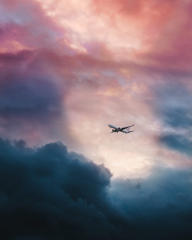 white plane flying over gray clouds, HD phone wallpaper