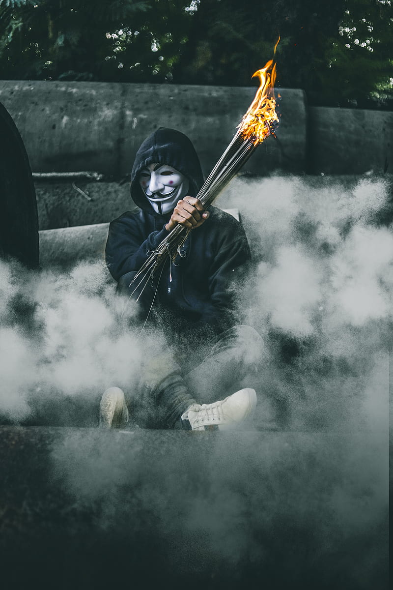 person wearing guy Fawkes's mask while holding torch, HD phone wallpaper