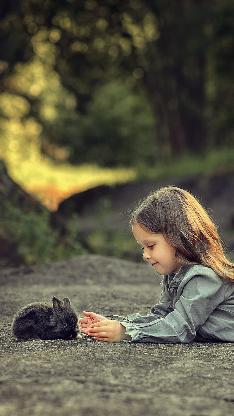 Girl Playing with rabbit , cute, little girl, child, HD phone wallpaper