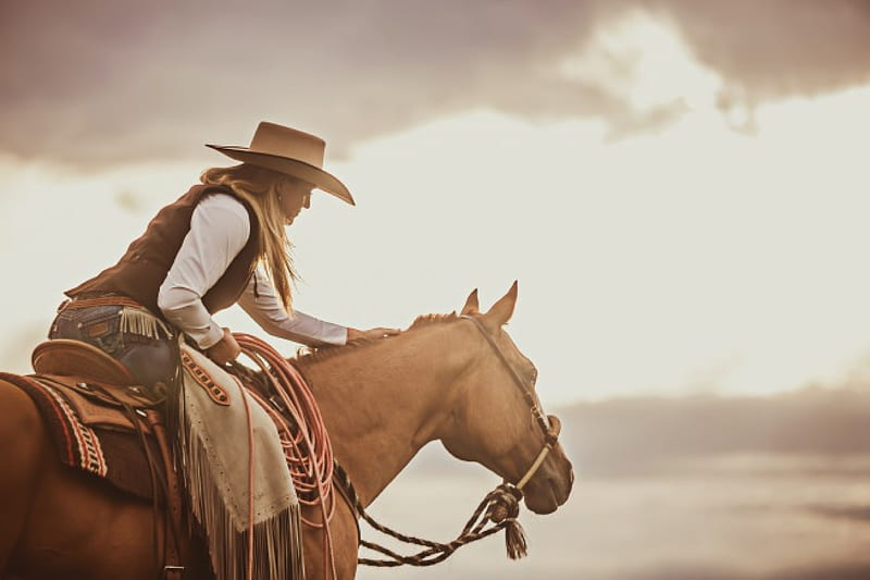 Cowgirl~Trinity Seely, cowgirl, chaps, saddle, Trinity Seely, horse, clouds, singer, hat, HD wallpaper