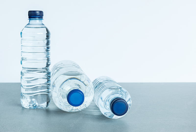 Premium . Three plastic bottles filled with mineral water on white background, HD wallpaper