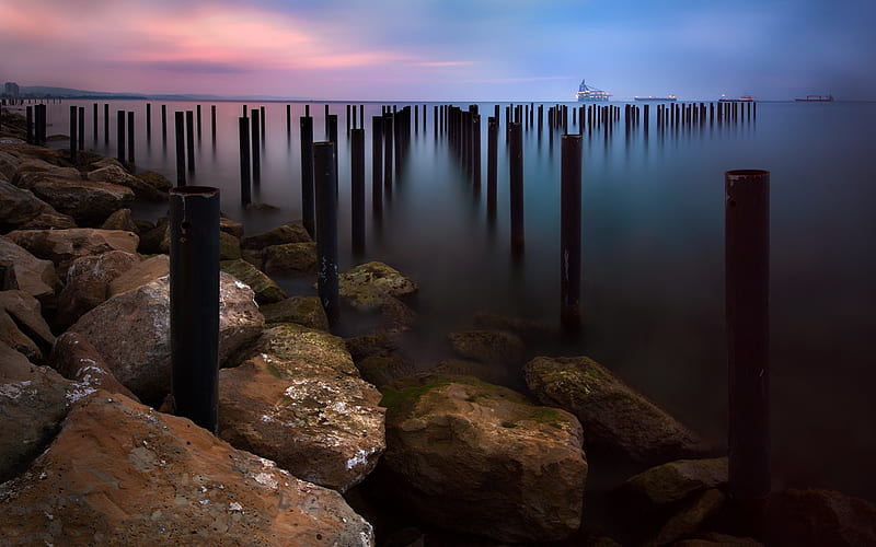 metal post in a bay shoreline, ships, rocks, shore, pipes, sunset, bay, HD wallpaper