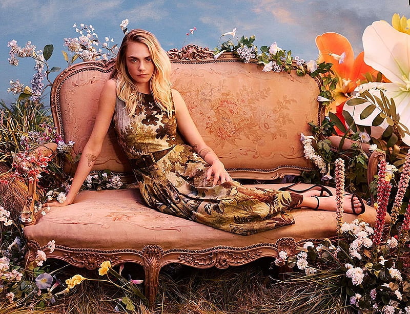 Cara Delevingne, fall colours pattern on dress, posing on couch, brunette, belt, open toe black heels, HD wallpaper