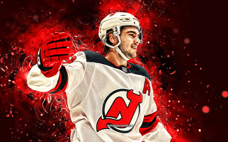 Download Nico Hischier in Action on the Ice Wallpaper