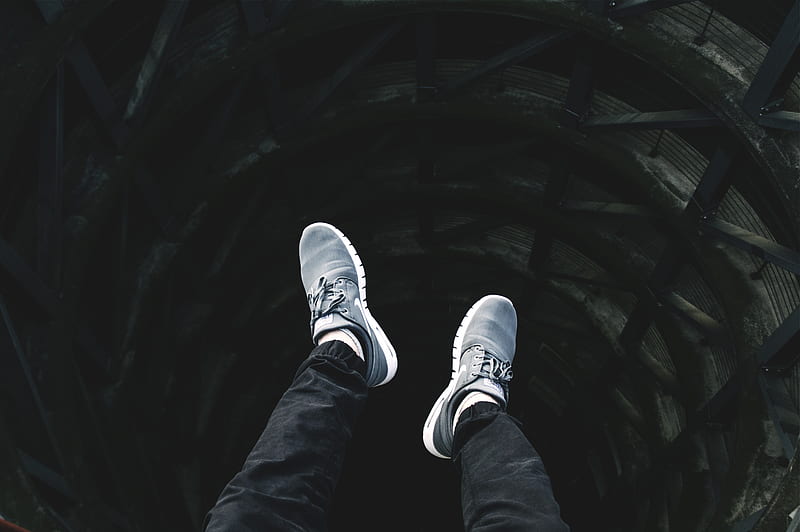 person showing pair of gray lace-up low-top sneakers, HD wallpaper