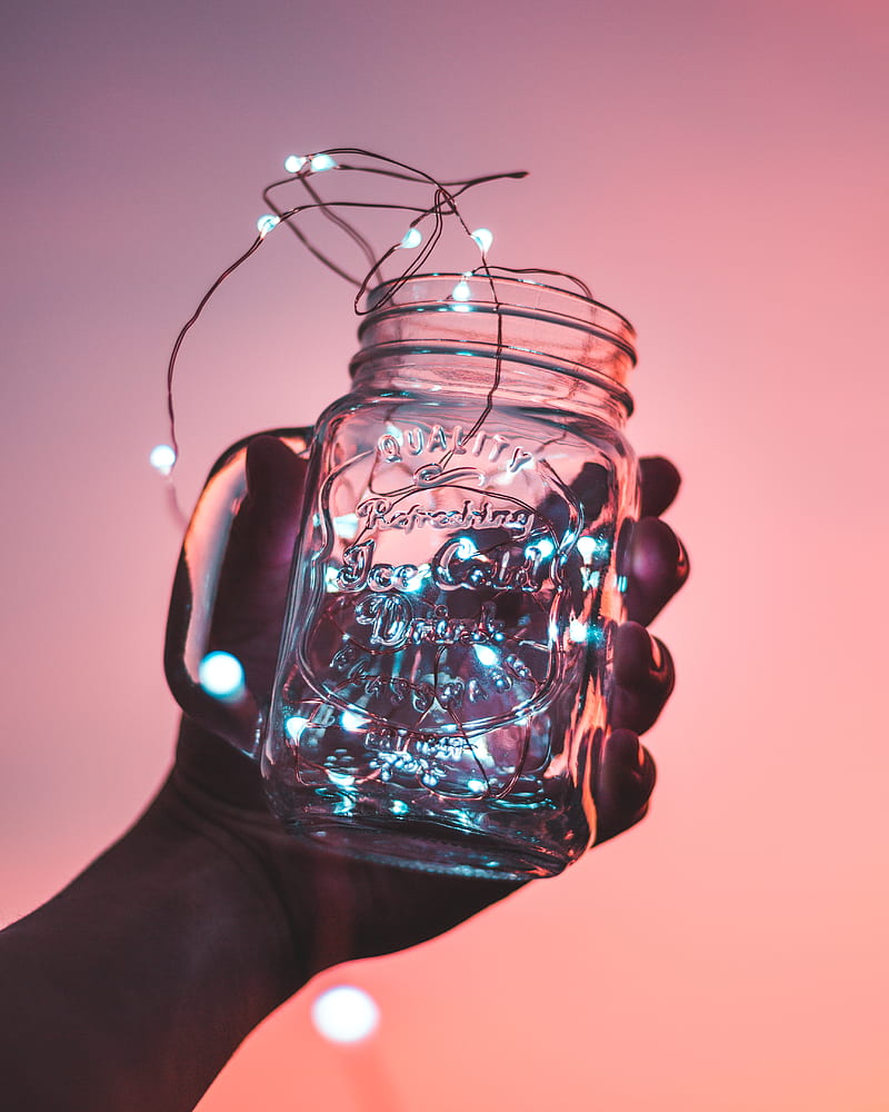 person holding clear glass mason jar with strip lights inside, HD phone wallpaper