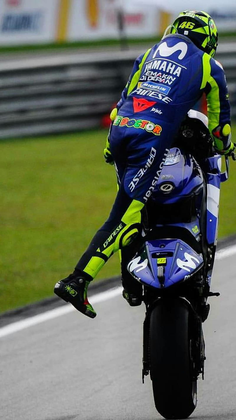 Rossi wheelie, motor, motorcycle, premium, valentino rossi, motogp, HD phone wallpaper