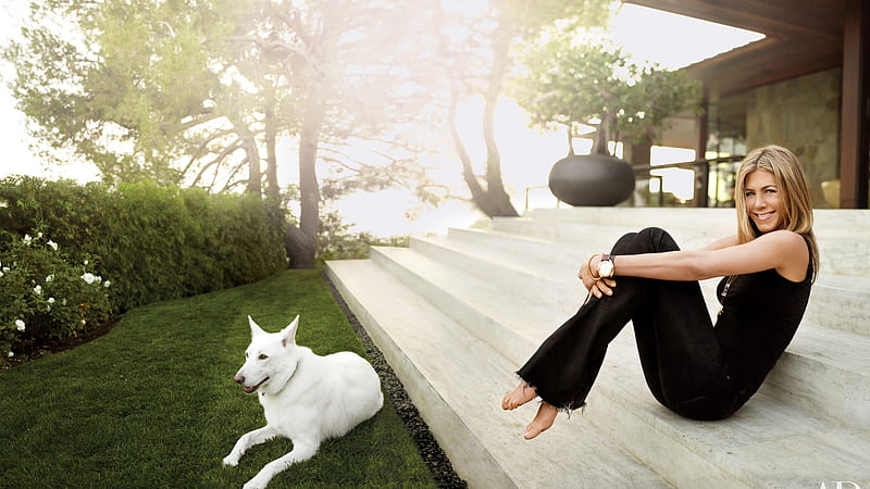Black Dress Wearing Jennifer Aniston Is Sitting On Steps Near A White Dog With Background Of Trees And Sunbeam Jennifer Aniston, HD wallpaper