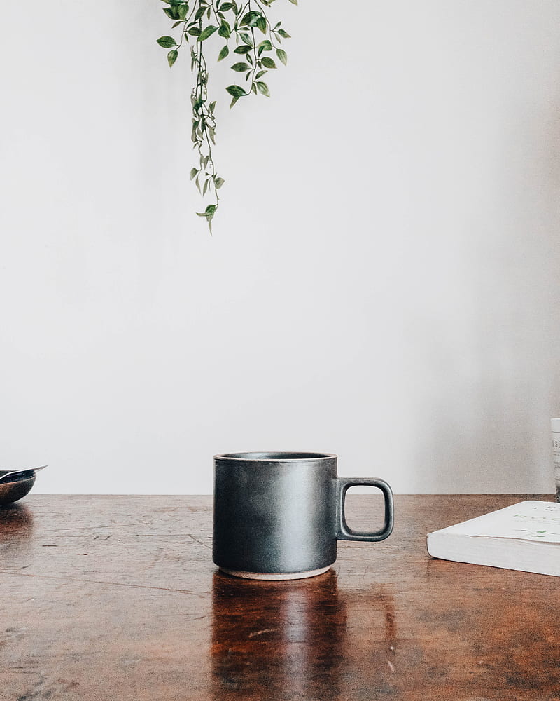black ceramic mug on brown wooden table, HD phone wallpaper