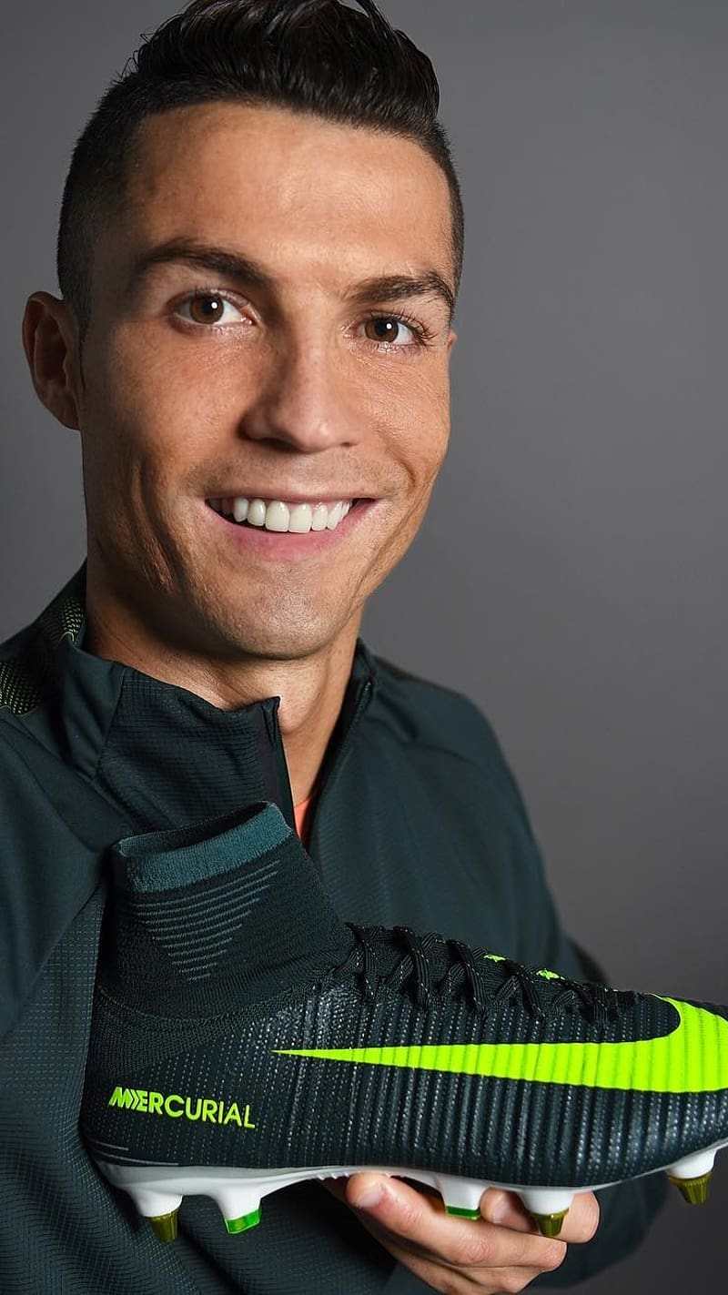 Cr7 Holding Mercurial Boots, cr7, football, shoes, mercurial shoes, smile, HD phone wallpaper