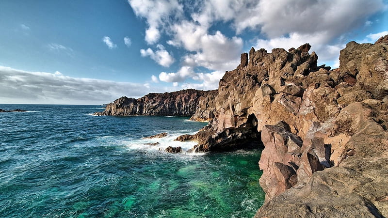 wonderful grotto in a rocky sea shore, rocks, shore, grotto, clouds, sea, HD wallpaper