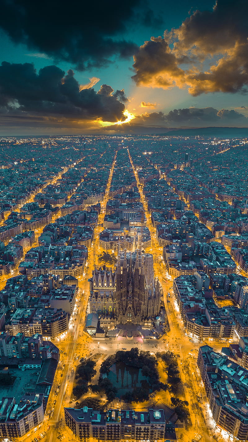 Sunset in Barcelona, aerial, blue, city grid, cloud, cool tone, cool tones, dark, eixample, europe, grid, light rays, lights, overview, perfect shape, spain, street, sun, sunrise, symmetry, the sim, video game, yellow, HD phone wallpaper