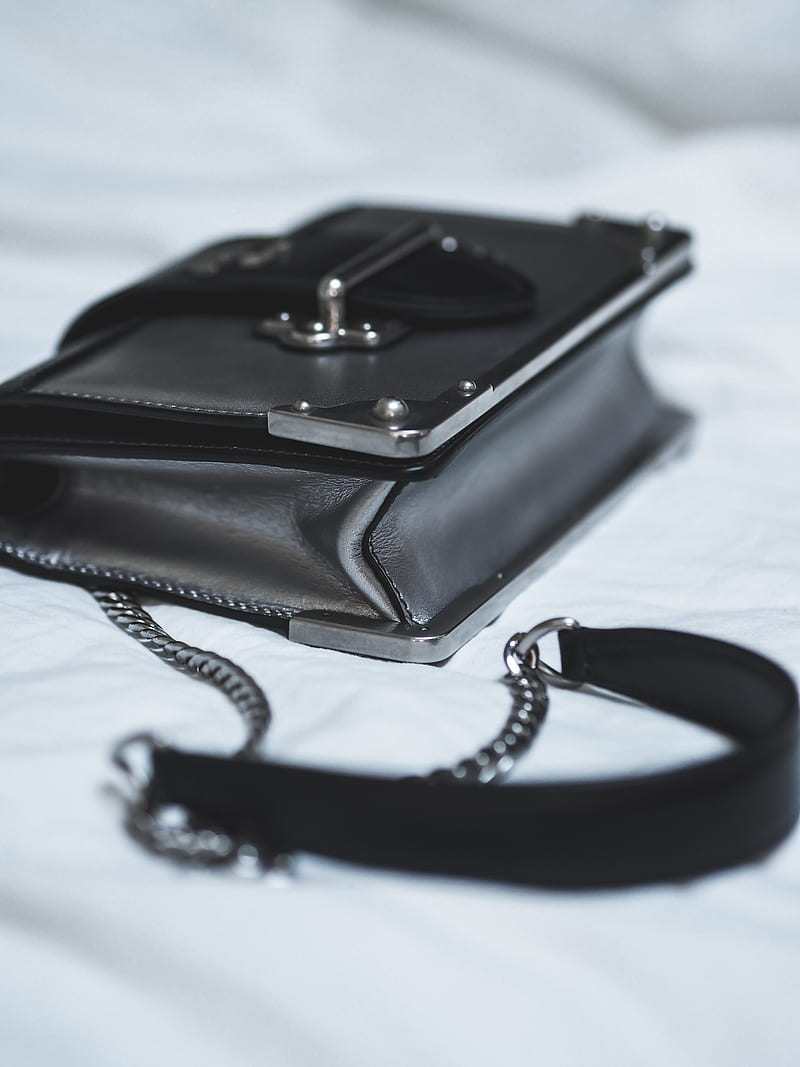 black leather sling bag on white textile, HD phone wallpaper