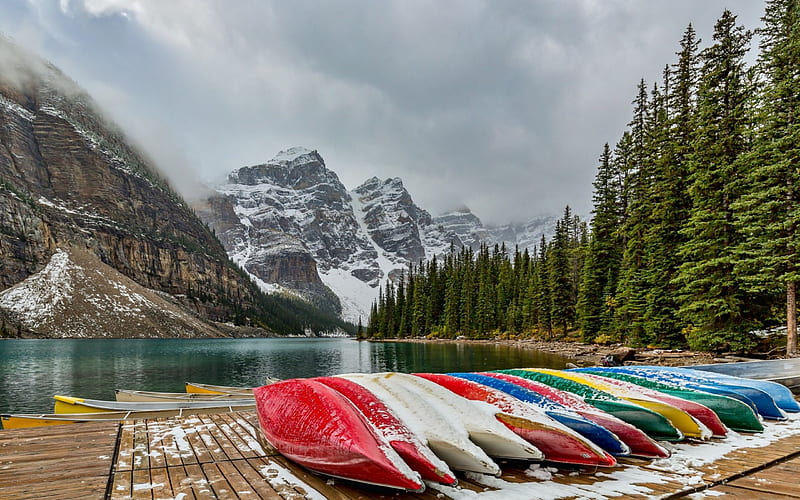 First Snowfall at Moraine Lake, forest, snow, mountains, canoes, lake, canada, HD wallpaper