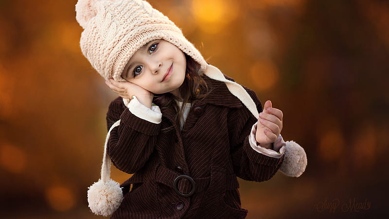 Cute Little Girl Is Leaning Head On Hand Wearing Brown Dress And Woolen Knitted Cap In Blur Bokeh Background Cute, HD wallpaper