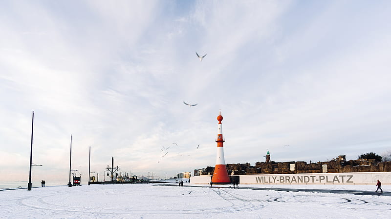 brown and white lighthouse on snow covered ground under cloudy sky during daytime, HD wallpaper