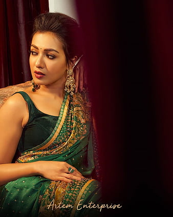 Village Chic: Ruhani Sharma's Sexy Pose In Traditional Green Saree Elegance