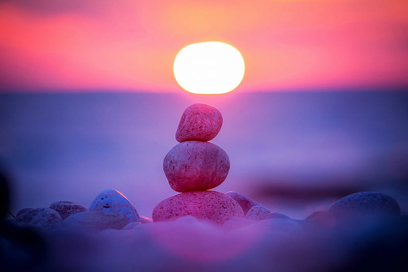 Small cairn on beach backdropped by a pink sunset, rocks, beach, sun, ocean, cairn, sunset, pink, night, HD wallpaper