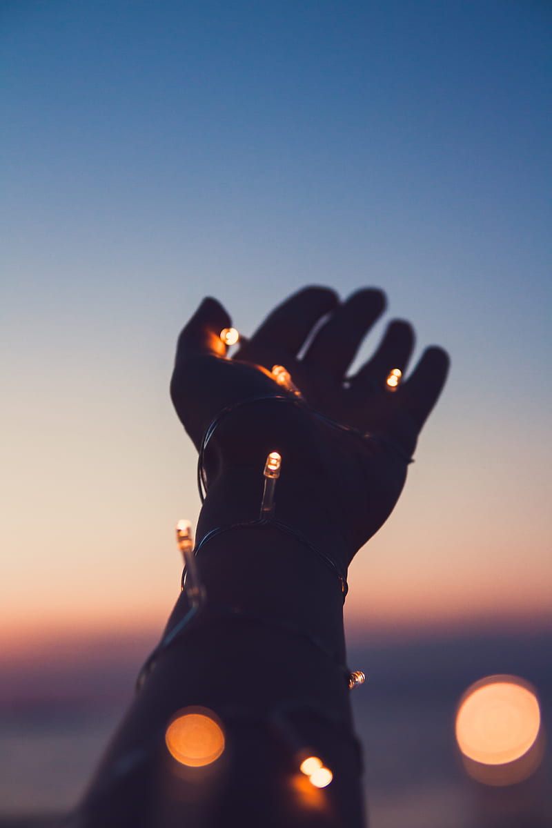 person showing left hand with string lights, HD phone wallpaper