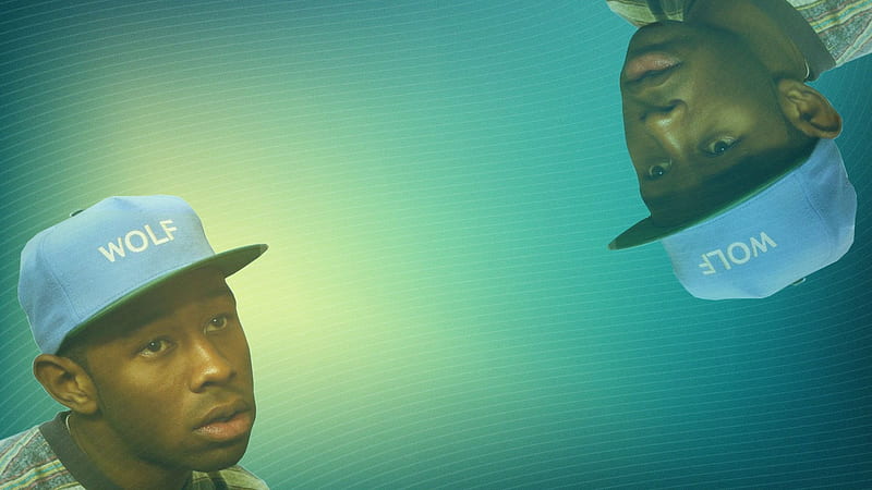 Tyler The Creator Is Wearing Wolf Word Blue Cap In A Blue Background Music, HD wallpaper