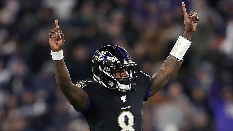Lamar Jackson Is Wearing Black Sports Dress And Helmet With Hands In The Air In A Blur Audience Background Sports, HD wallpaper