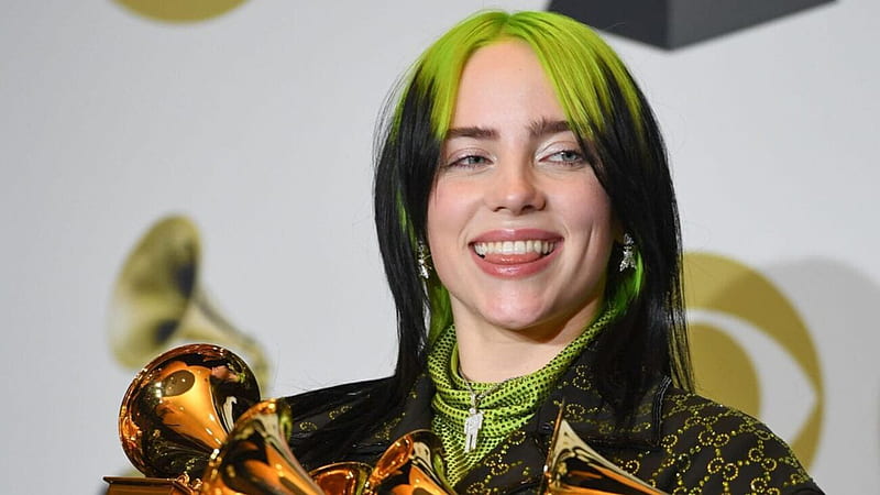 Billie Eilish's iconic green outfit and blue hair - wide 4