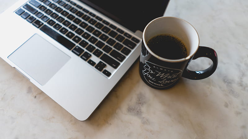 coffee in mug beside MacBook Pro, HD wallpaper
