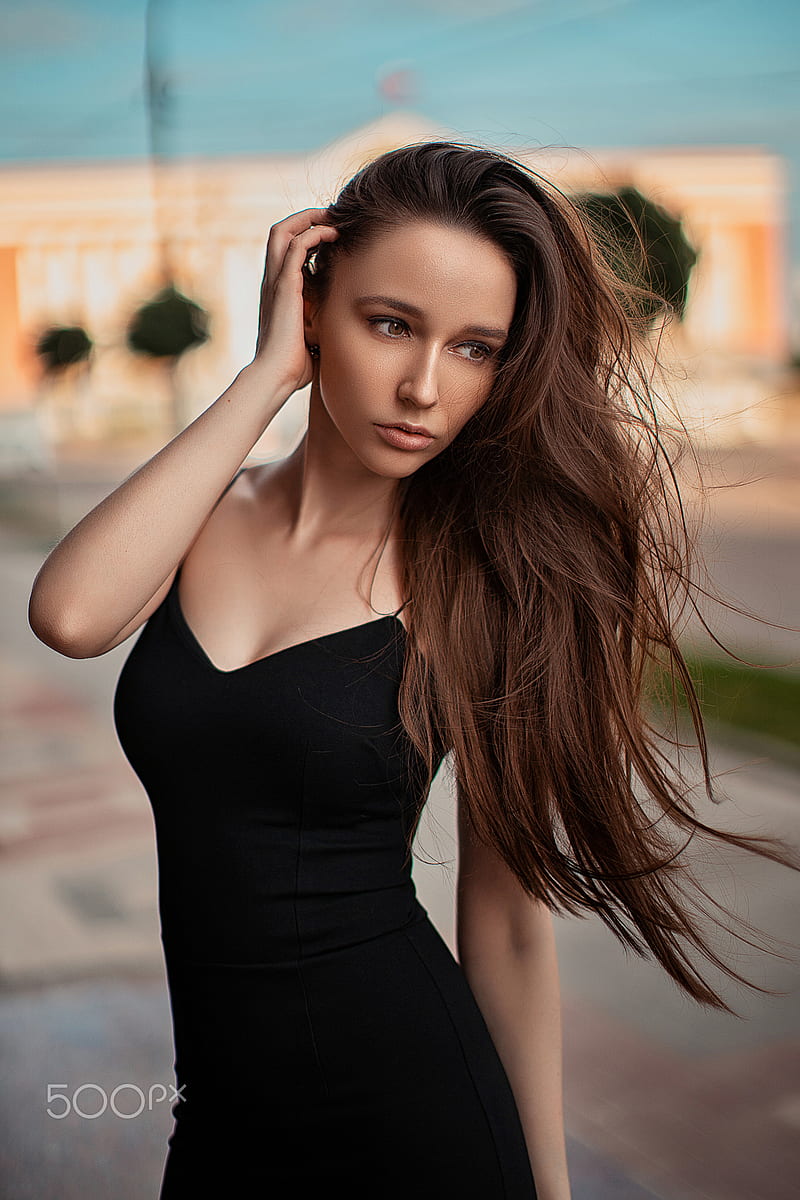Sergey Shishlov, women, brunette, long hair, wind, looking away, brown eyes, makeup, dress, black clothing, outdoors, HD phone wallpaper
