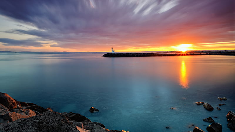 Sunlight, sun, ocean, colors, bonito, sunset, sky, clouds, lighthouse, sea, stones, rays, nature, sunrise, island, reflection, HD wallpaper