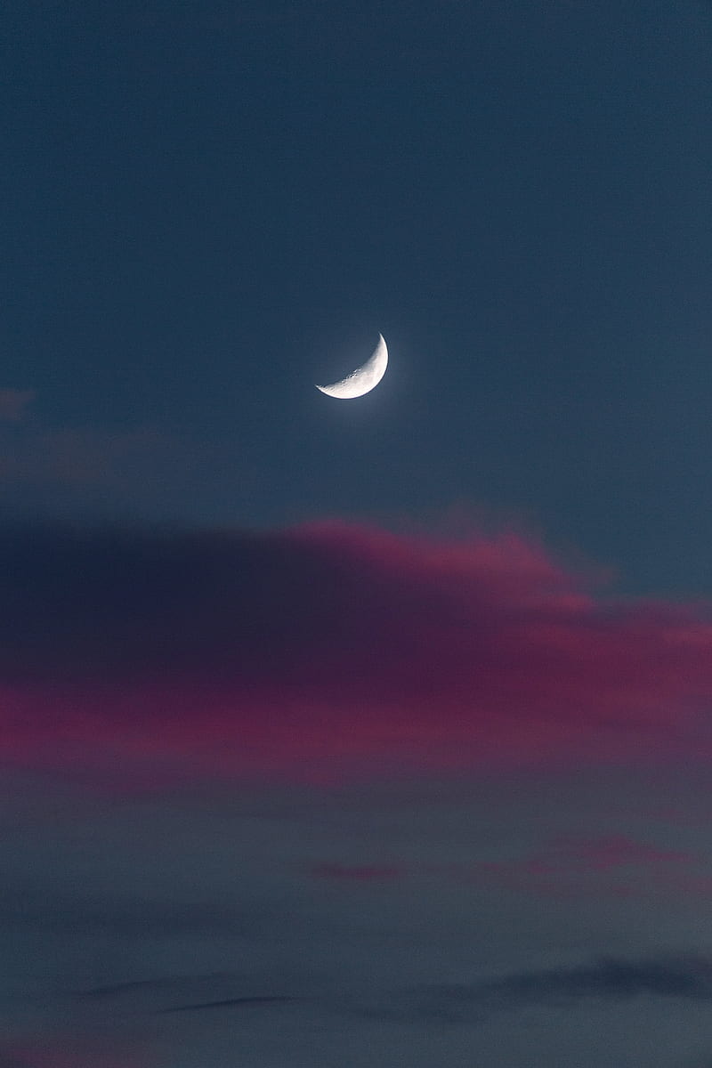 Closeup crescent view of the moon looking perfect in front of bright stars  2K wallpaper download