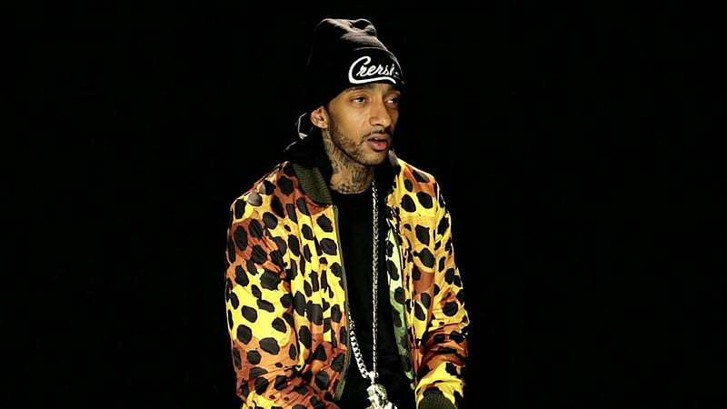 Nipsey Hussle Is Wearing Colorful Coat And Black Cap In A Black Background Music, HD wallpaper