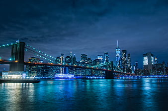 City skyline across body of water during night time, HD wallpaper | Peakpx