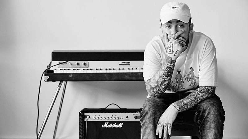 Mac Miller Is Sitting On A Chair And Wearing White T-Shirt And Cap With A Background of Piano 13 Celebrities, HD wallpaper
