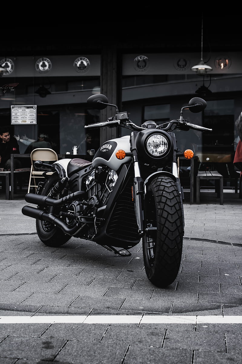 black and gray cruiser motorcycle parked beside black concrete building, HD phone wallpaper