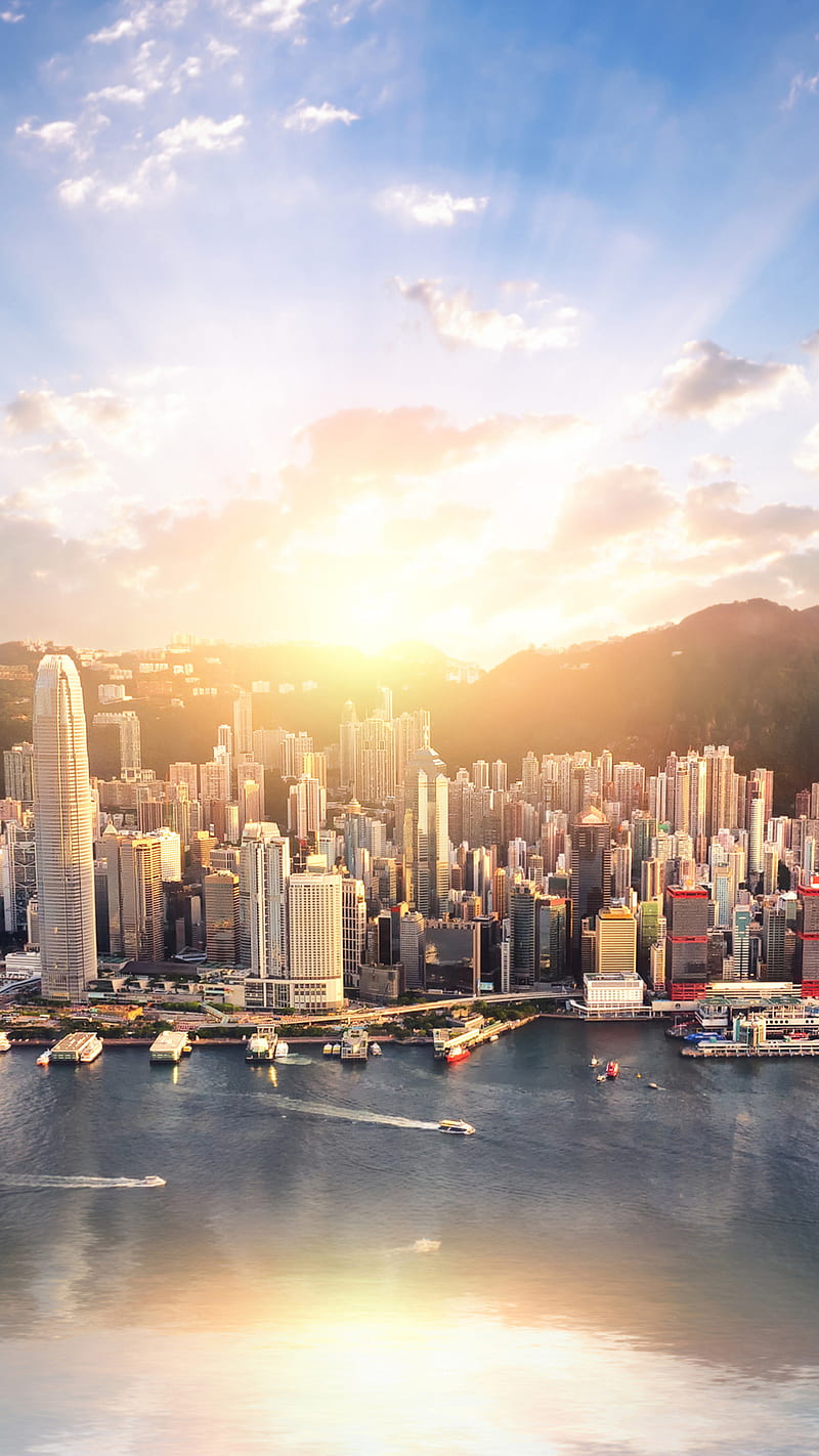 Hình nền Hong Kong cityscape sẽ khiến bạn phát cuồng vì thích. Từng tòa nhà cao tầng cùng ánh đèn đang lung linh và ảnh đẹp về mảnh đất này sẽ khiến cho chiếc điện thoại của bạn trở nên đặc biệt hơn bao giờ hết.
