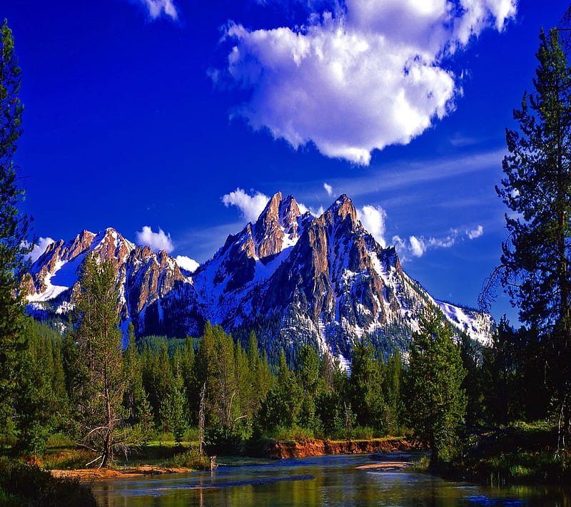 Hình nền Mountain Nature Wallpaper đem đến cho bạn cảm giác bình yên và gần gũi với thiên nhiên. Những bức ảnh tuyệt đẹp của các ngọn núi trùng điệp với bầu trời xanh sẽ khiến bạn ngẩn ngơ và được thoải mái tận hưởng khung cảnh tuyệt đẹp này.