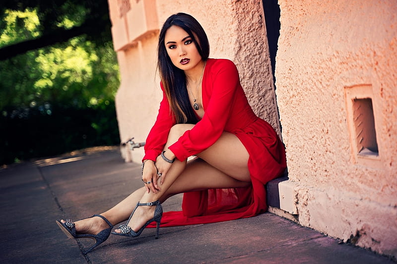 Tracie Dang-Perez, bracelet, exposed left leg, Brunette, long red dress, pendant, pink walls, sitting in doorway, adjusting left heel, HD wallpaper