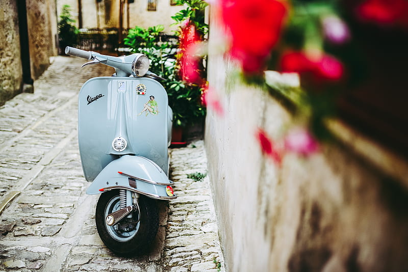 selective focus of blue motor scooter beside concrete wall, HD wallpaper