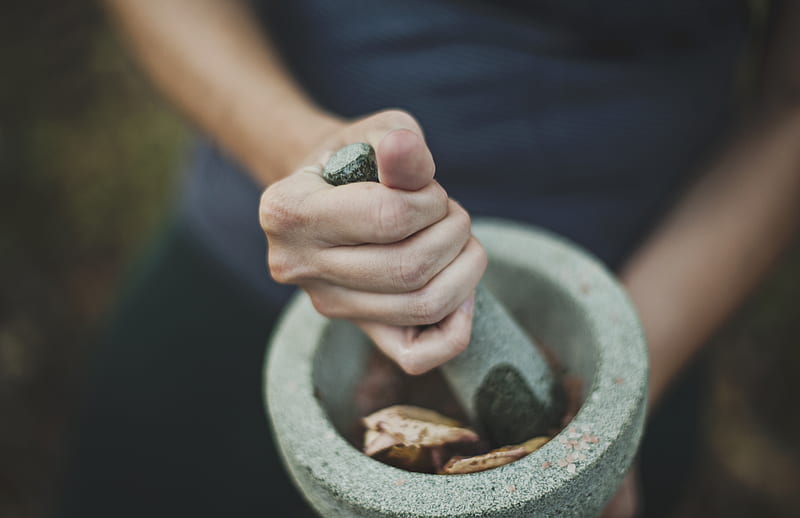 person grinding on mortar and pestle, HD wallpaper